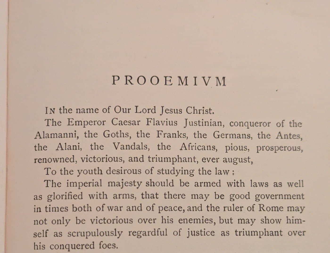 The Prooemium page of Moyle's translation of the Institutes, beginning: The imperial majesty should be armed with laws as well as glorified with arms